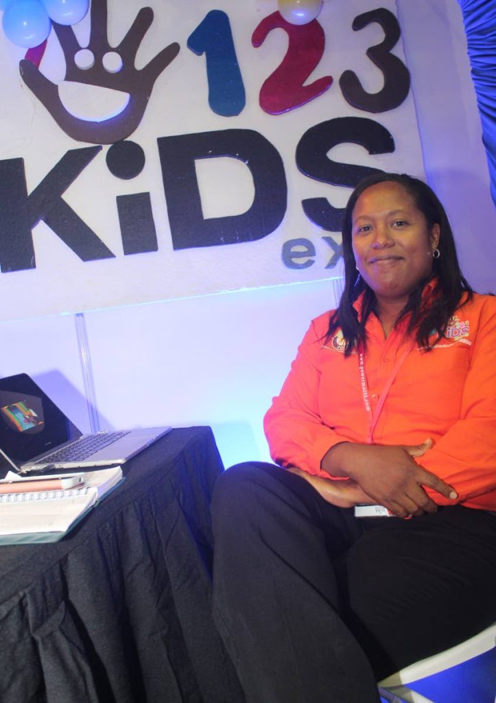 Kaisha Lee A Ping-Alfred, CEO of Trendy Trade Show Company and show director of 123 Kids Expo, seated in the 123 Kids Expo booth at TIC 2018. PHOTO BY ENRIQUE ASSOON. July 5, 2018