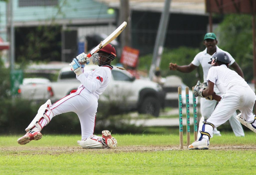 TT batsman Nicholas Ali survives a stumping in an earlier match against Guyana in the Cricket West Indies regional under 17 tournament at Gilbert Park, Couva.


Holder                                 14-7-18