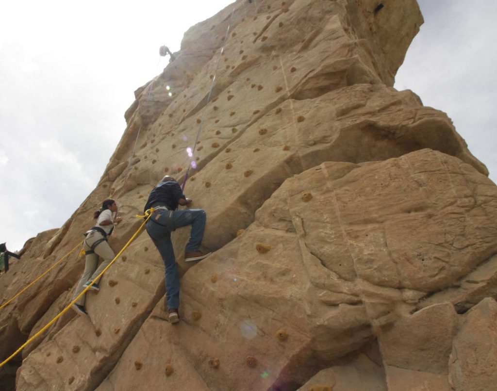 Climbers take to rock climbing at Skallywag Bay Adventure Park, CHAGUARAMAS.