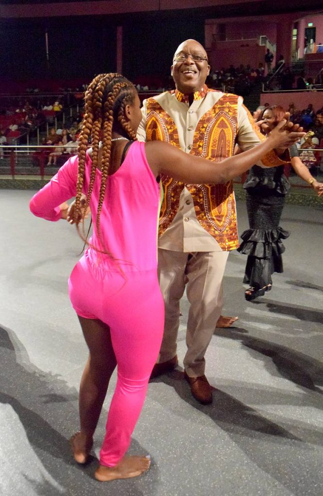 Chief Secretary Kelvin Charles dances with a performer with the Tobago THETA Company at the close of festivities of the opening ceremony of the Tobago Heritage Festival on Friday night at Shaw Park Cultural Complex. Photo by Vidya Thurab