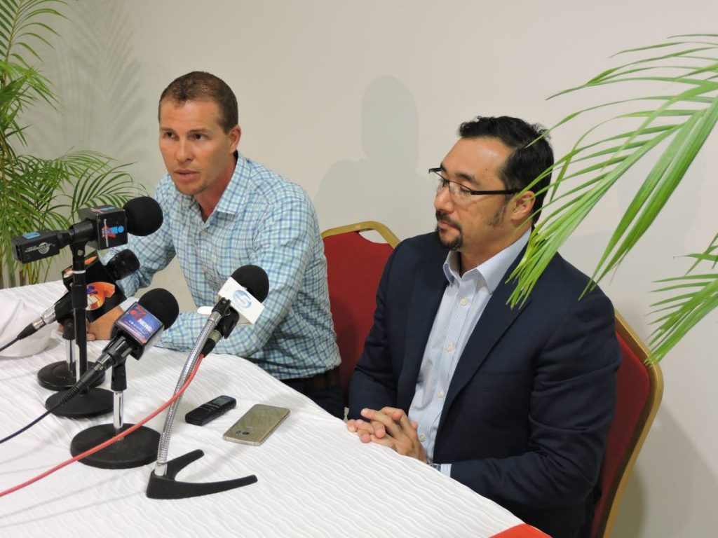 Communications Minister Stuart Young, right,  and Adam Stewart, Deputy Chairman of Sandals group at a press conference in Tobago on Tuesday. 

Photo: Kinnesha George