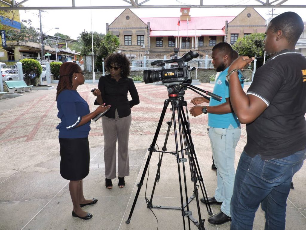 Minority Councillor Faith BYisrael speaks to reporters at a press conference at James Park, Scarborough on Tuesday. Photo by Kinnesha George-Harry
