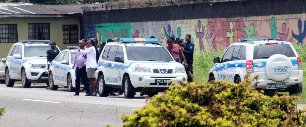 Police on the scene at a recent shooting. A trauma specialist Hanif Benjamin says, 