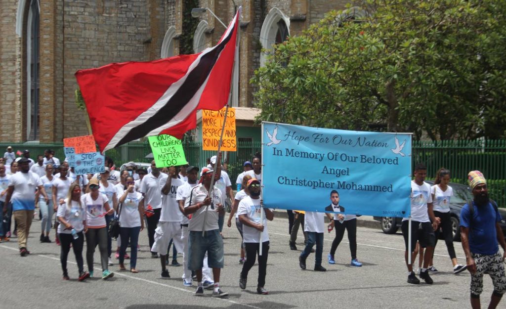 MARCH FOR PEACE: Social pressure group Building TT staged a march for peace yesterday in Port of Spain in memory of murdered Uber driver Christopher Mohammed.