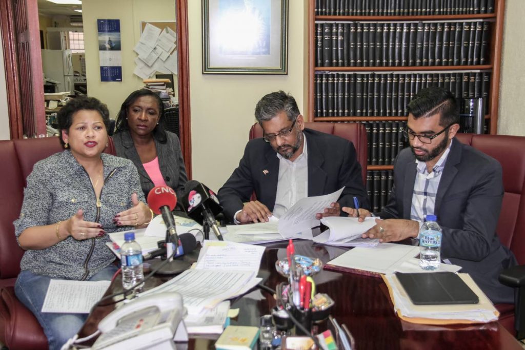 QUESTIONS: Attorney Nyree Alfonso, former Port Authority general manager Charmaine Lewis, former Transport Minister Devant Maharaj and Opposition senator Saddam Hosein at a press conference on the Galleons Passage at Alfonso’s St Vincent Street, Port of Spain office on Sunday.