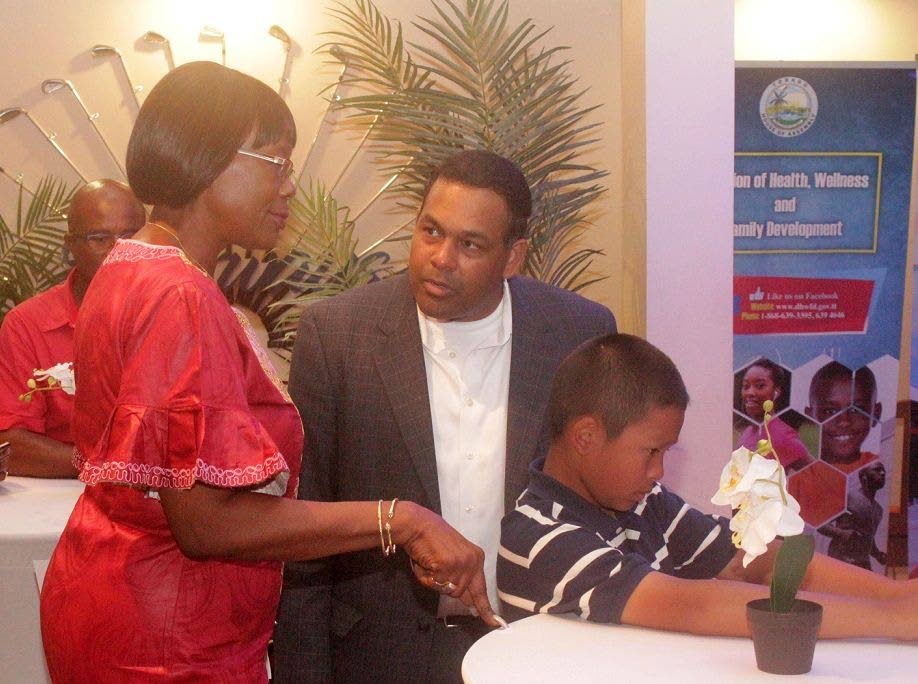 Health Secretary Dr Agatha Carrington, left, chats with a member of the Trinbago Progressive Association at a welcome reception on July16 at the Fairways Restaurant and Golf Lounge, Lowlands.