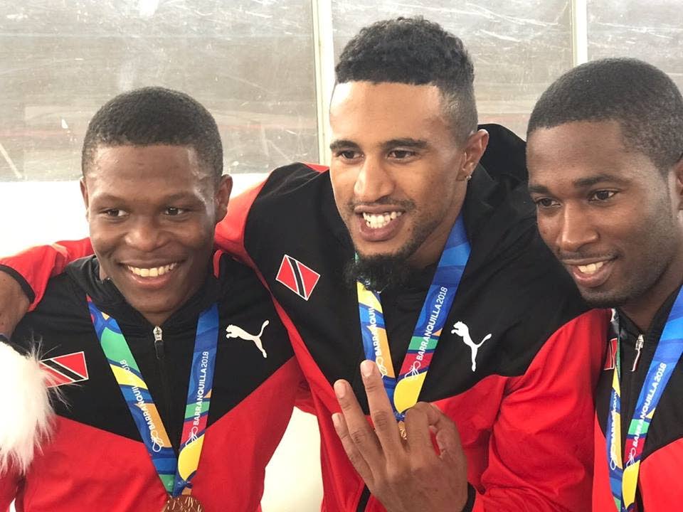 Nicholas Paul (L), Njisane Phillip and Kwesi Browne (R) pose with their gold medals after placing first yesterday in the Men’s team sprint, at the CAC Games, Colombia. via Team TTO.
