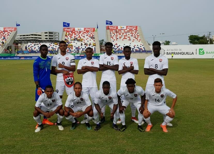 The national under-20 men's footballers take a team photo ahead of a match in the CAC Games in Colombia. 