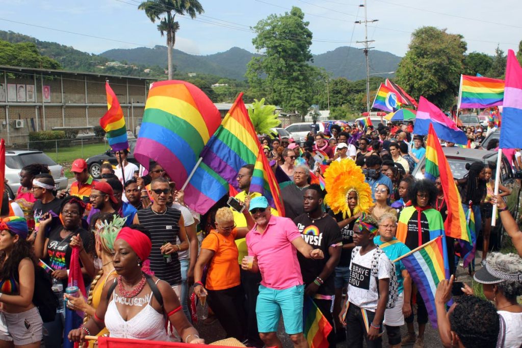 Members of the LGBTQI community and well wishers take part in TT's first gay pride parade throught the streets of Port of Spain in July 2018.
