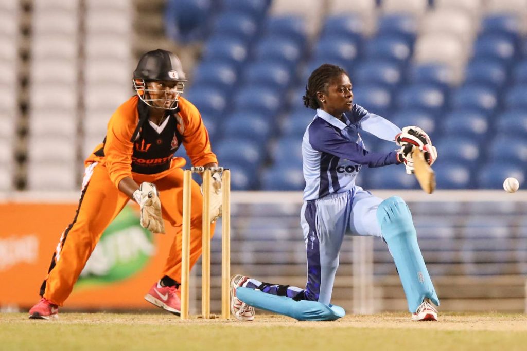 Central Sharks' Felicia Walters plays a sweep shot in the Courts T20 Grand Slam eliminator vs Trident  Sports Phoenix on Friday at the Brian Lara Academy, Tarouba.
