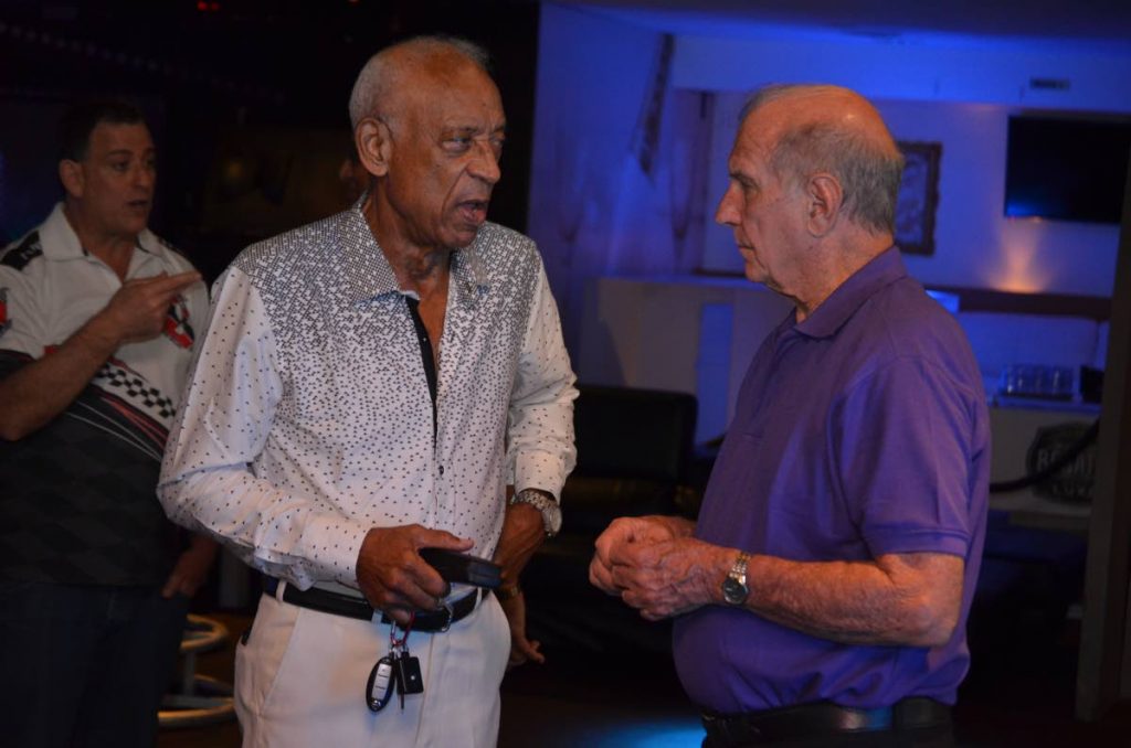 Ken Gordon, left, one of the founders of TT Great Race, chats with Donald Hadden of Seeing Red, the 1971 Great Race winner, at the launch of the 2018 Great Race at 51 Degrees Lounge on Cipriani Boulevard, Port of Spain, recently. 