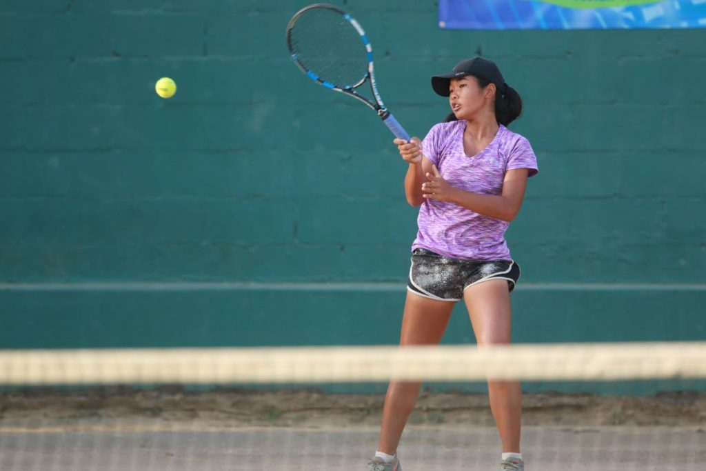 Yin Lee Assang hit a forehand at a previous tennis tournament. 