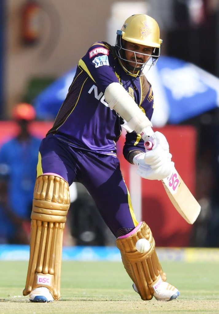 Kolkata Knight Riders cricketer Sunil Narine plays a shot during the 2018 IPL  T20 match between Kings XI Punjab and Kolkata Knight Riders at the Holkar Cricket Stadium in 
Indore on May 12.