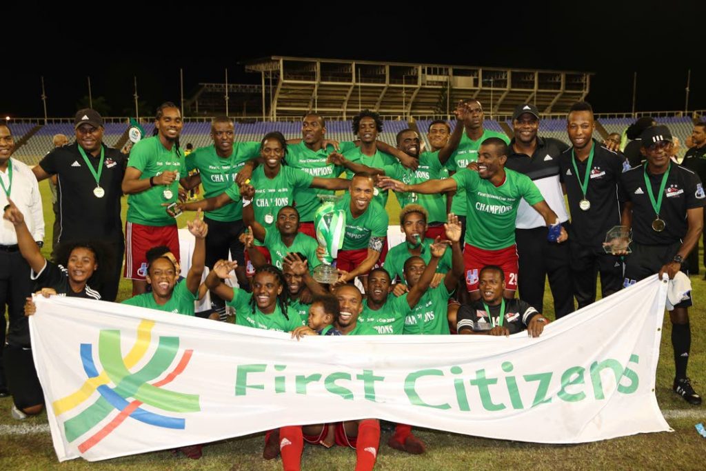 Central FC players and management celebrate victory in the First Citizens Cup final at the Hasely Crawford Stadium, Mucurapo, recently.