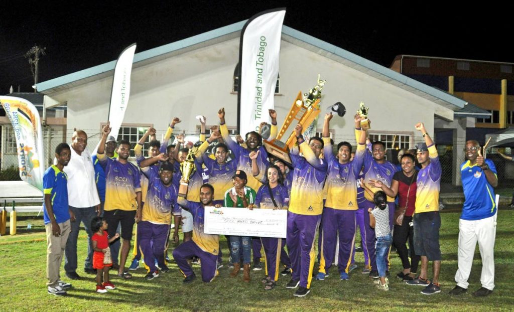 SCCL Hard Drive men celebrate a clean sweep in the BP TT Mayaro cricket competition. Celebrating with them are Jameson Rigues (left), Corporate Secretary, All-Mayaro Sports Foundation (AMSF); Matthew Pierre (second from left), Community Liaison Officer, BPTT; and Bartholomew “Bunny” Lynch, president, AMSF.