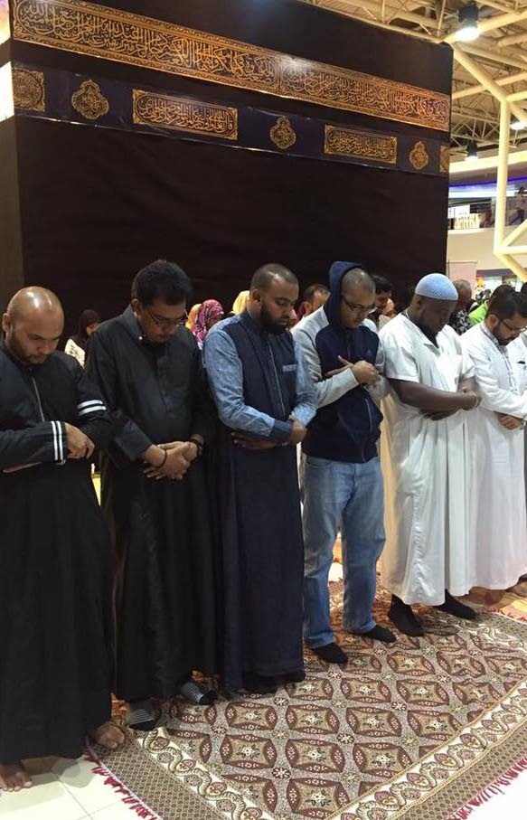 Minister of Rural Development and Local Government Kazim Hosein joins members of the Muslim community at a 'Revival of the Ummah' event, Gulf City Mall, La Romaine, recently.

