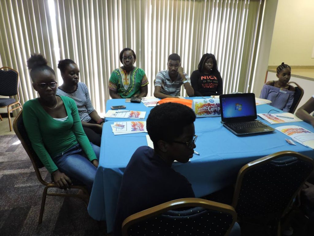 A group of students gather for the start of the Division of Finance’s You-Biz youth camp at the start of the programme on Monday at the Victor E Bruce Financial Complex in Scarborough. Photo by Kinnesha George-Harry