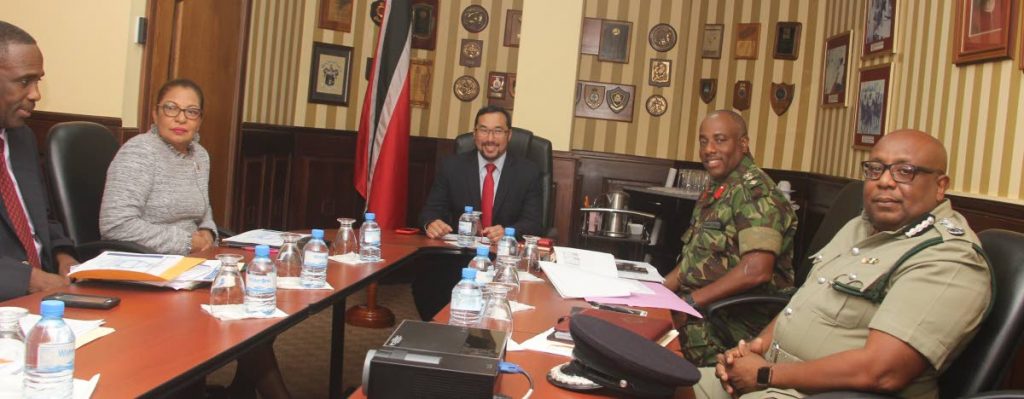 On the Job. New National Security Minister Stuart Young meets with top officials at the ministry's office at Temple Court on his first  day in office. PHOTO COURTESY  THE MINISTRY OFNATIONAL SECURITY