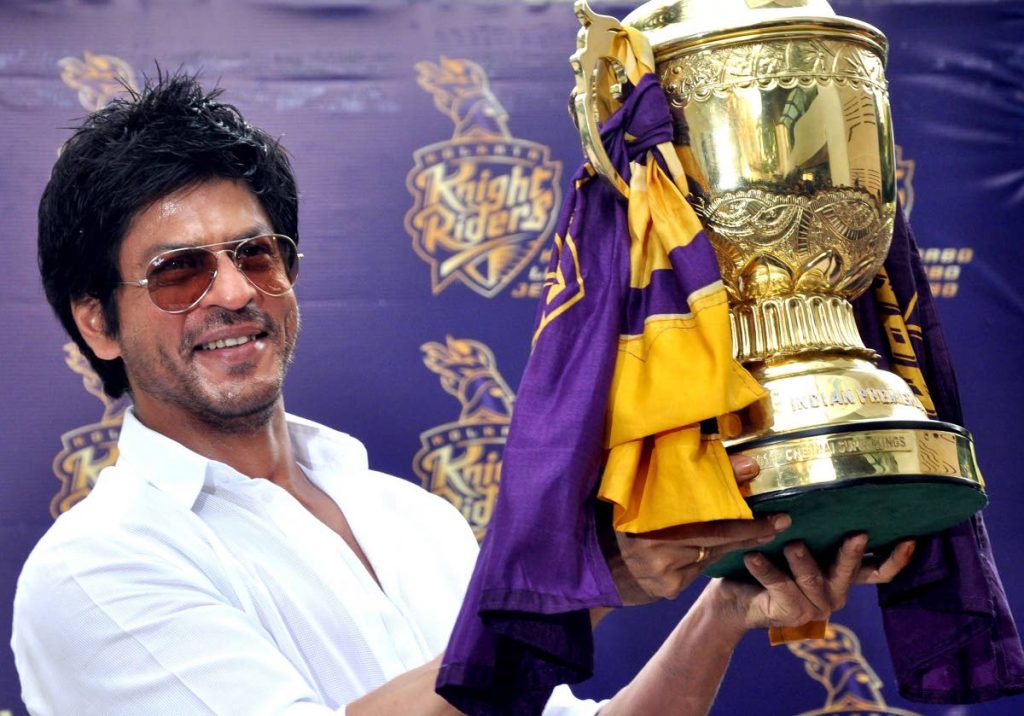 Indian Bollywood actor and co-owner of Trinbago Knight Riders and Kolkata Knight Riders (KKR) poses with the Indian Premier League trophy after KKR won the league previously.
