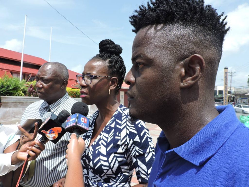 Christlyn Moore, Political Leader of the Tobago Forwards, flanked by the party’s Chairman Orwin Dillon, left, and Deputy Chairman Kevon McKenna, addresses members of the media at a press conference on Tuesday at the Scarborough Port. 