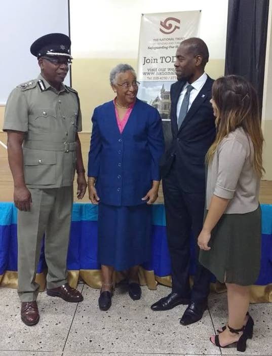 HISTORIC CHAT: National Trust Chairman Margaret McDowall (second from left) chats with (from left) Acting Commissioner of Police Stephen Williams, National Security Ministry Permanent Secretary Vel Lewis and US/ICOMOS Intern Mayrelis Hernandez following a lecture on Wednesday night at the St James Police Barracks. 