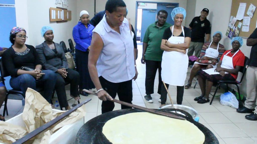 TT’s Ambassador to the UN, Pennelope Beckles-Robinson concentrates on her roti making. Beckles-Robinson visited The Rose Foundation’s Beyond Borders programme cuisine exchange at the Beetham Gardens Community Centre last August.