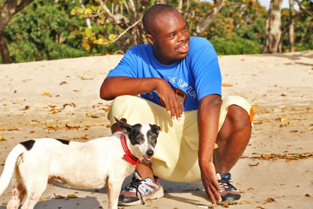 Keron McLetchie, HWH groom, spends quality time with Lopez, the dog. Photo: Welmoet Falke