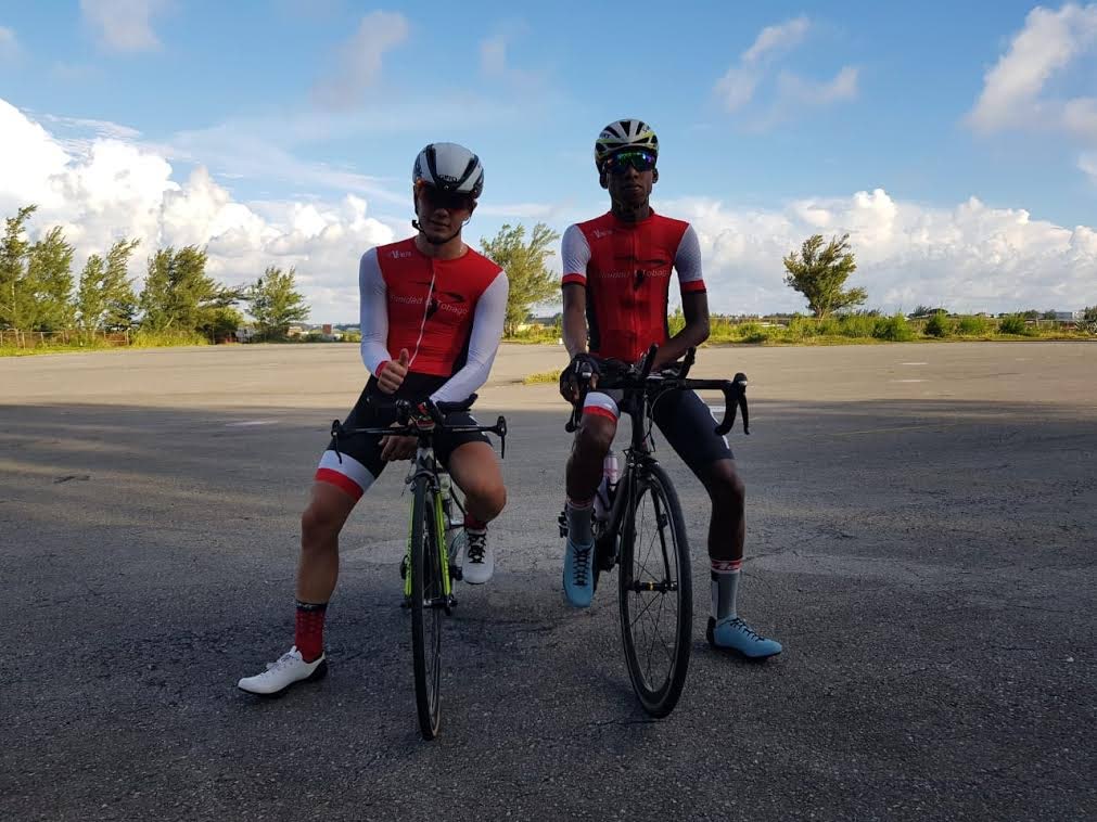 TT junior cyclist Enrique Comarmond, left, and juvenile Tarique Woods at the 2018 Junior Caribbean Cycling Championships held in Bermuda last weekend. 