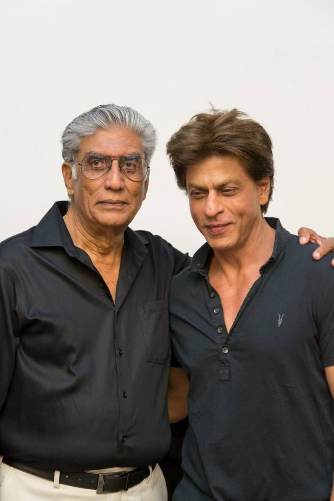 Tony Maharaj, left, Chairman and CEO of Caribbean Lifestyle Communications - parent company of Radio 90.5FM - poses with Bollywood star and Trinbago Knight Riders co-owner Shah Rukh Khan on his visit to Trinidad recently. 
