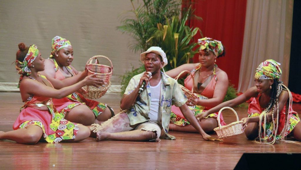 Malick Folk Performing Company members perform a skit at the launch of National Patriotism Month during the Best Village Folk Festival, Southern Academy for Performing Arts on Friday. 
