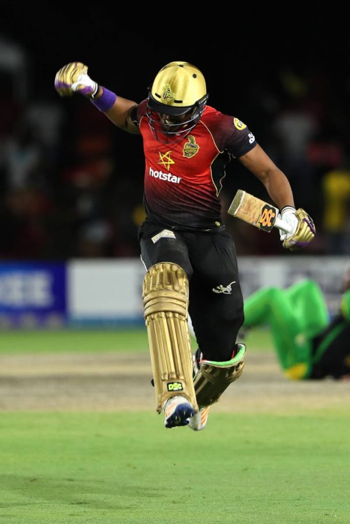 Javon Searles of Trinbago Knight Riders celebrates hitting the winning runs during the Hero Caribbean Premier League match between Jamaica Tallawahs and Trinbago Knight Riders at Central Broward Regional Park on Sunday in Fort Lauderdale, United States. 