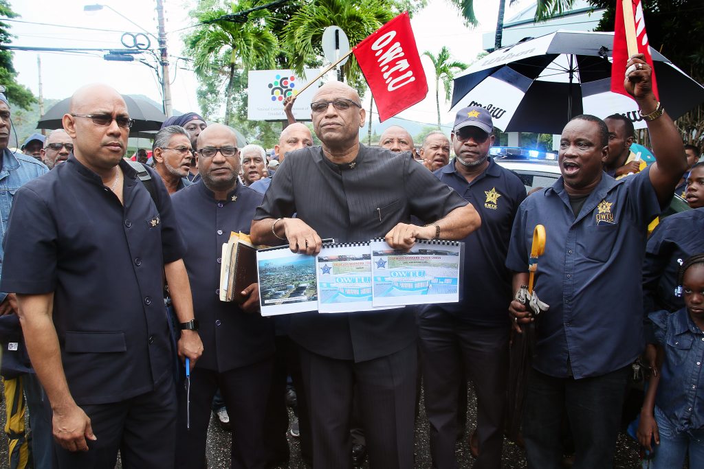 File Photo: OWTU president Ancil Roget armed with PETROTRIN proposals arrives outside the ofice of the PM St Clair
PHOTO BY AZLAN MOHAMMED
Tuesday, 21st August, 2018.