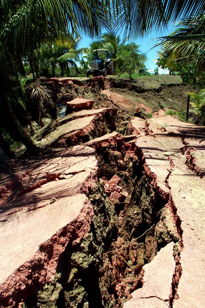 Huge cracks on the Los Iros Hillview Road after the earthquake. PHOTO BY ANIL RAMPERSAD.