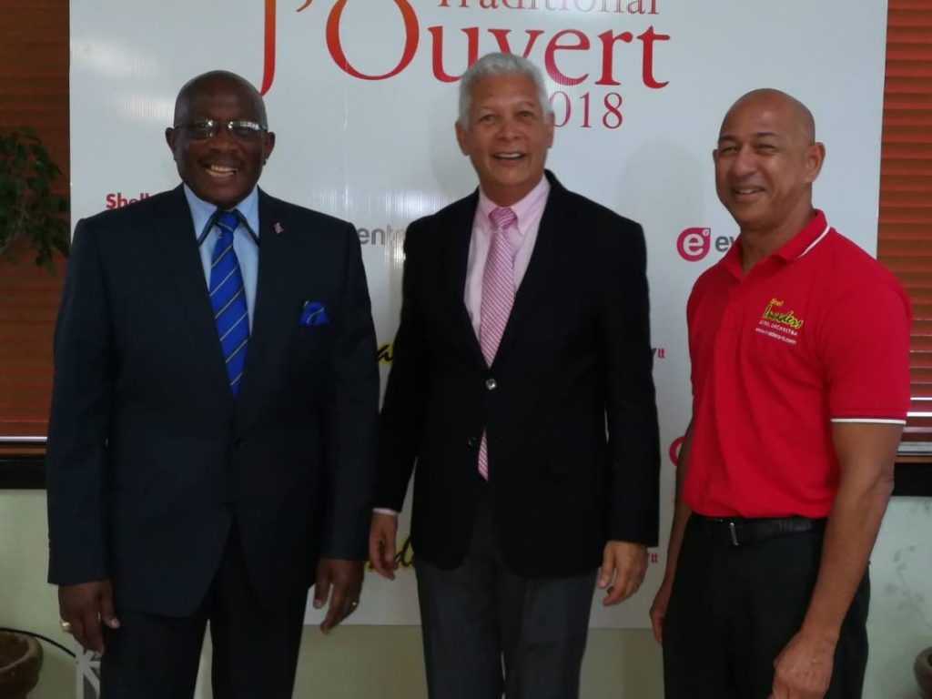 Sharing joy at the launch of the Republic Day Invaders J’Ouvert Jump Up are NCC chairman Winston “Gypsy” Peters,  left, Port of Spain Mayor Joel Martinez and Invaders’ manager Michael Din Chong.