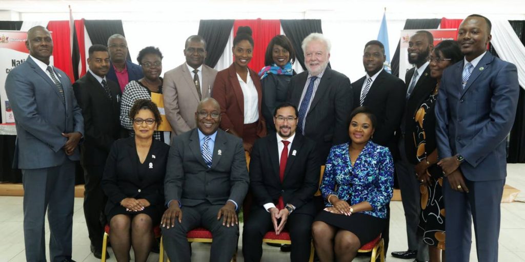 Chief Secretary Kelvin Charles, second from left, sits with National Security Minister Stuart Young, Tobago West MP and Minister of Sport and Youth Affairs Shamfa Cudjoe, right, and Parliamentary Secretary in the Ministry of National Security, Glenda Jennings-Smith, along with members of the National Crime Prevention Programme’s Community Council of Tobago.  Photo: THA Info Dept