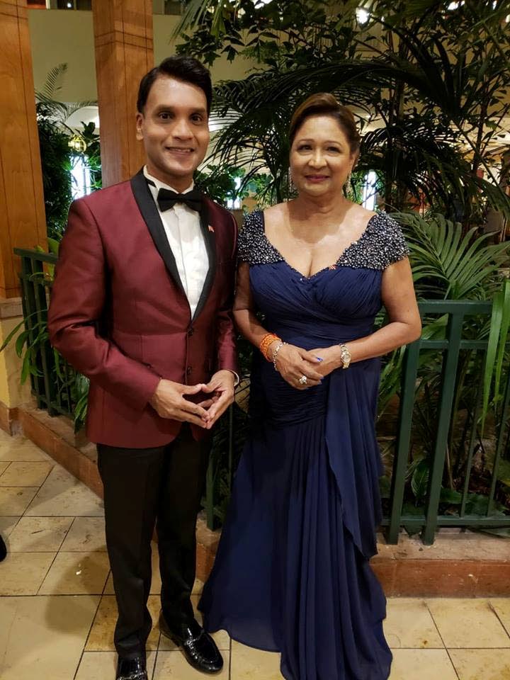 DRESSED UP: United National Congress leader Kamla Persad-Bissessar and Princes Town MP Barry Padarath at Saturday’s Let’s Unite Independence gala dinner in Tampa, Florida on Saturday.