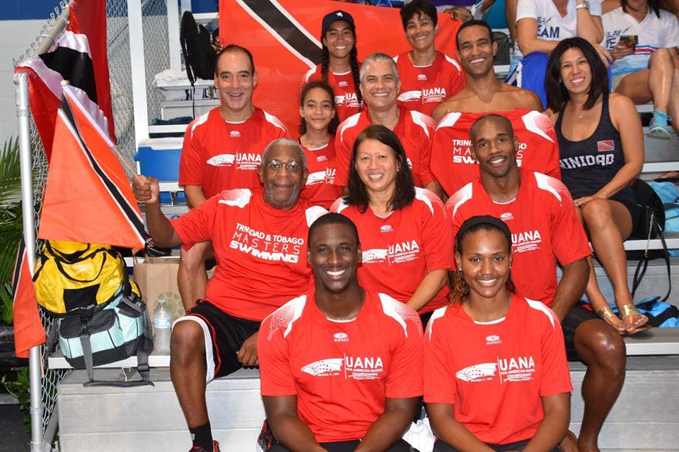 National masters swimmers proudly wear TT colours at the Pan Am Masters Championships in Orlando recently. 
