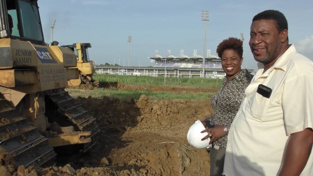 TT Football Association president David John-Williams, right, alongside former vice-president Joanne Salazar as they inspect work being done by the Junior Sammy Contractors Limited at the Home of Football project in Couva earlier this year. PHOTO COURTESY TTFA