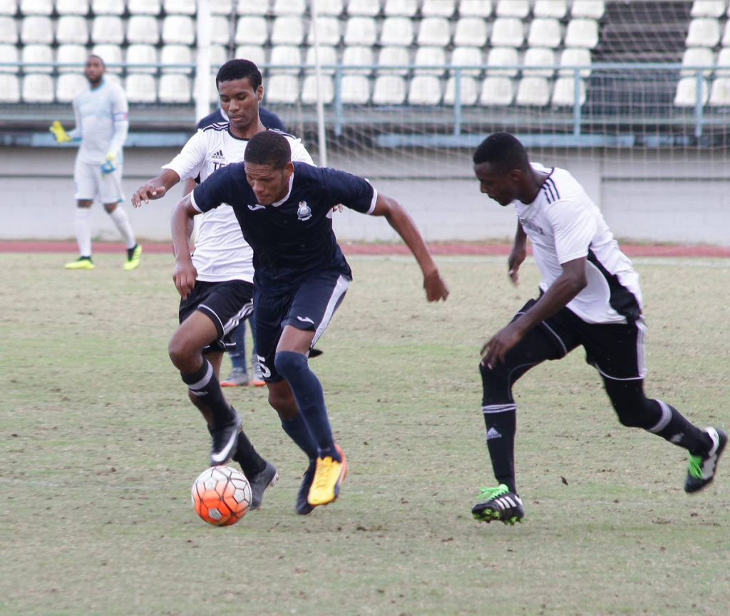 FLASHBACK: Police FC's Christian Thomas, centre, in action vs St Ann's Rangers previously. Thomas had a goal and an assist in a 3-0 win against Central FC on Friday night in the TT Pro League.  PHOTO BY ROGER JACOB 