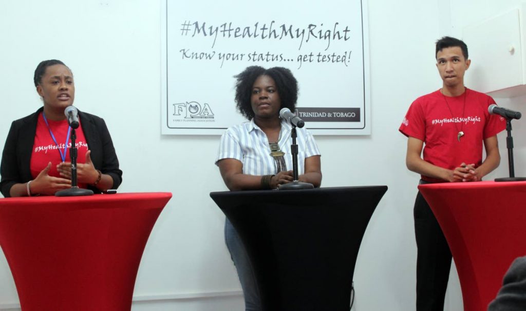 SPEAKING OUT: Khadija Pierre, Kimberly Gilbert and Kevin Lee a-Ping at De Living Room on Wednesday, discuss reproductive health and the Family Planning Association.