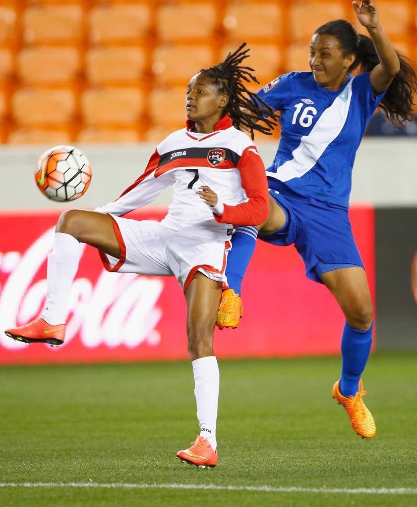 FLASHBACK...Kayla Taylor (left) during a recent match between TT and Guatemala.