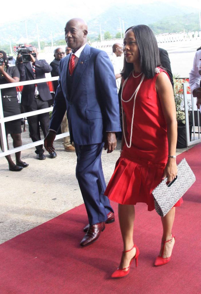 Independence date: Prime Minister Dr Keith Rowley and his wife Sharon arrive at the Grand Stand for the Independence Day parade at Queen's Park Savannah, Port of Spain yesterday. PHOTO BY ANGELO MARCELLE