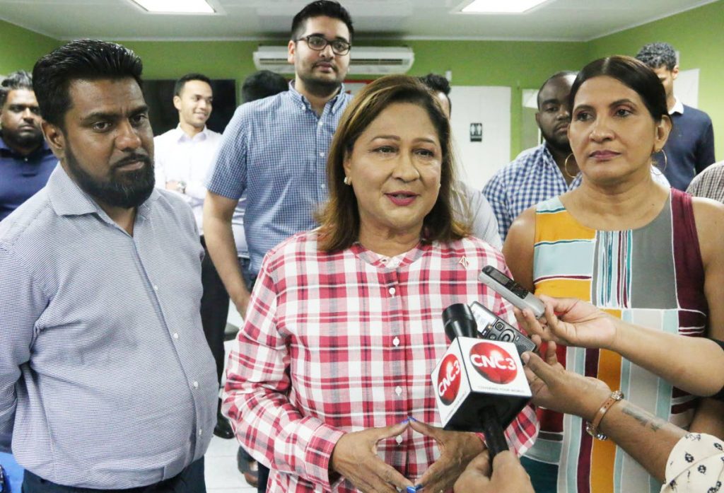 Save the refinery: Opposition Leader Kamla Persad-Bissessar speaks to the media at her constituency office in Penal yesterday. Persad-Bissessar urged the Prime Minister to reconsider closing down Petrotrin's refinery.
PHOTO BY ANSEL JEBODH