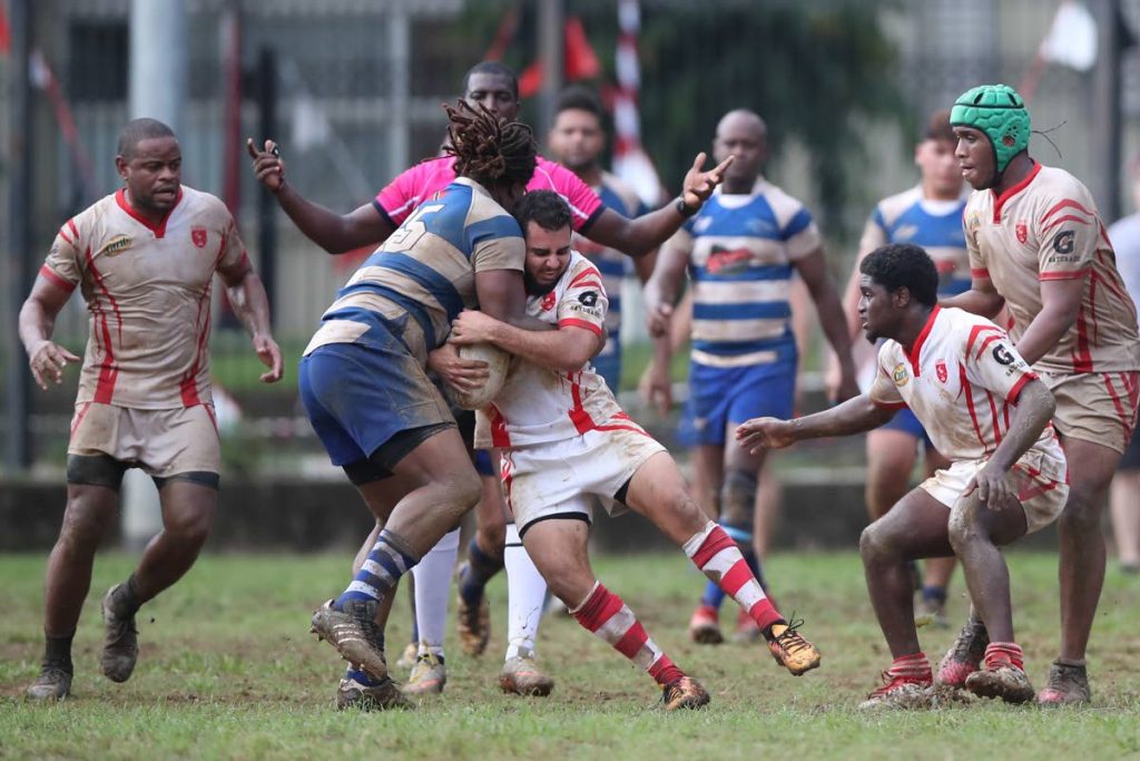 Northern’s 2nd row Kereem Figaro tackles Caribs scrum-half Renaldo Bermudez during the TTRFU Championship Division between Northerns Rugby Football Club and Caribs Rugby Football Club at President’s Grounds, St. Anns. The match ended 15-15.