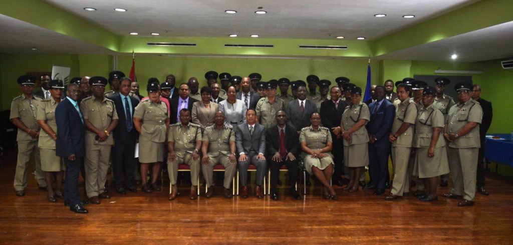Commissioner of Police, Gary Griffith, seated at centre along with (R) Deputy Commissioner of Police, Administration, Stephen Williams, Deputy Commissioner of Police (Ag.) Operations, Deodat Dulalchan, while to the left, Deputy Commissioner of Police (Ag.) Crime and Support, Harold Phillip and Assistant Commissioner of Police, Erla Christopher, are photographed with newly promoted officers to the ranks of Senior Superintendent of Police and Superintendent of Police, at the Solomon McLeod Lecture Theatre, Police Administration Building, Port of Spain, on Tuesday 4th September, 2018. Photo courtesy TTPS