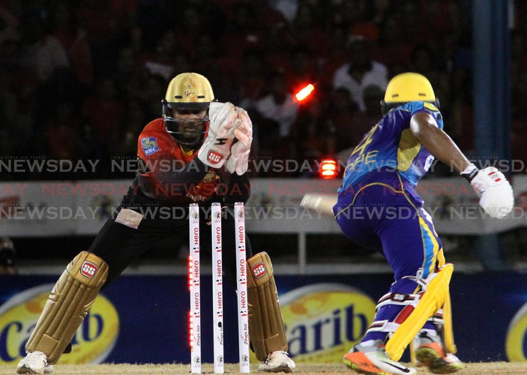 QUICK HANDS: Trinbago Knight Riders wicketkeeper Denesh Ramdin stumps out Barbados Tridents' Shai Hope during the Hero Caribbean Premier League game in 2018 at the Queen's Park Oval, St Clair. 