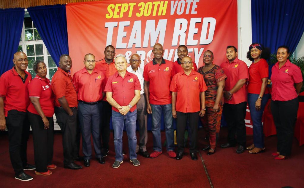 Team Red and Rowley: Prime Minister Dr Keith Rowley, centre, with his team during the campaign launch at Arima Borough Corporation on September 8. Rowley is uncontested as political leader in today’s internal election. FILE PHOTO