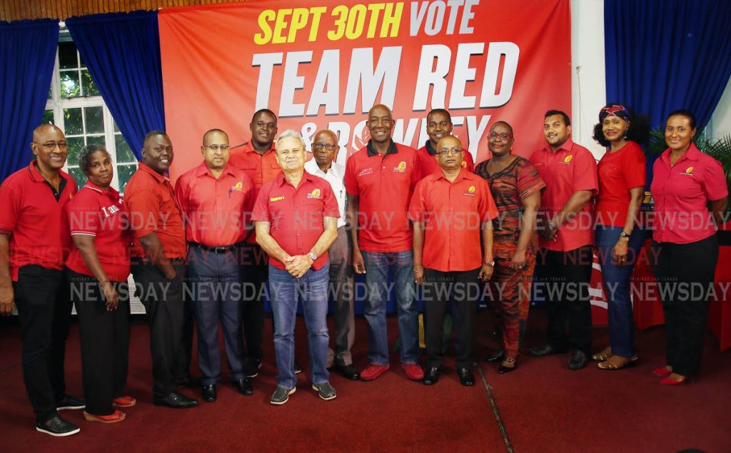  Rowley's team: Prime Minister Dr Keith Rowley, centre, with his slate of candidates for the PNM internal election, from left, Robert Le Hunte, Irene Hinds, Abdon Mason, Daniel Dookie, Ndale Young, Finance Minister Colm Imbert, Overand Padmore, Foster Cummings, Indar Parasram, Planning and Development Minister Camille Robinson-Regis, Avinash Singh, Labour Minister Jennifer Baptiste-Primus and Laurel Lezama at the Arima Town Hall, Arima yesterday. PHOTO BY AZLAN MOHAMMED
