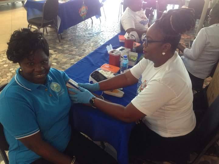 A TRHA workers gets tested t a health fair last Thursday, at the Gulf City Mall, Lowlands