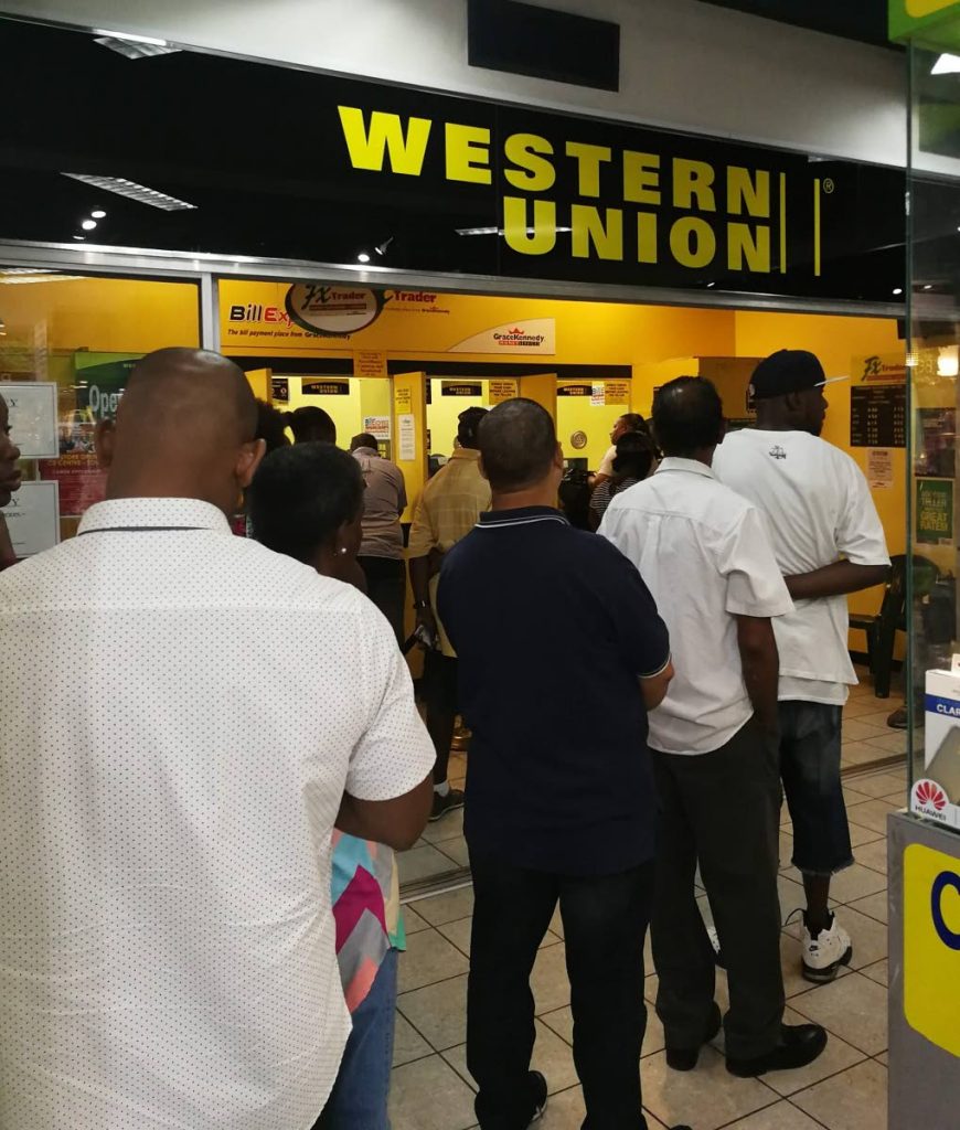 Western Union agent location at Excellent Stores' Uptown Mall, corner Frederick and Park Streets, Port of Spain. PHOTO BY SASHA HARRINANAN